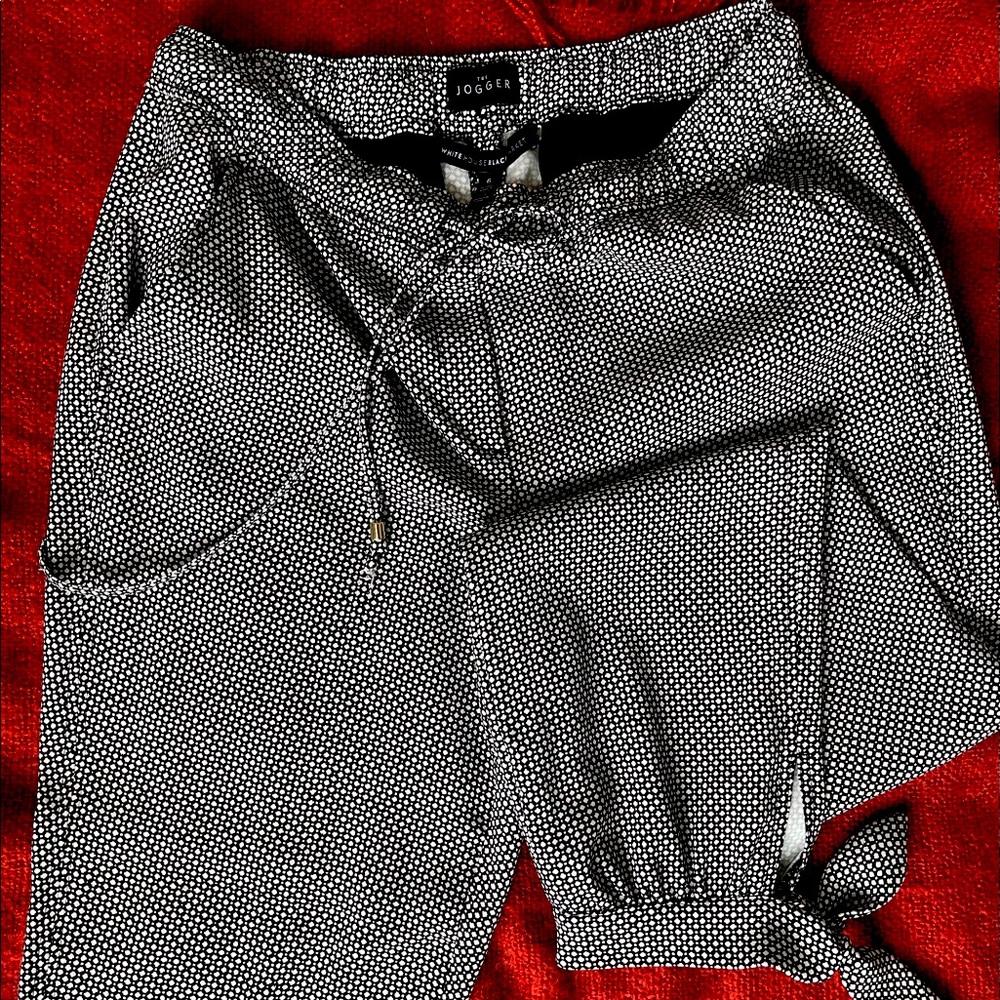 Black & White Joggers with Drawstring waist and Ties around the ankle. WHBL